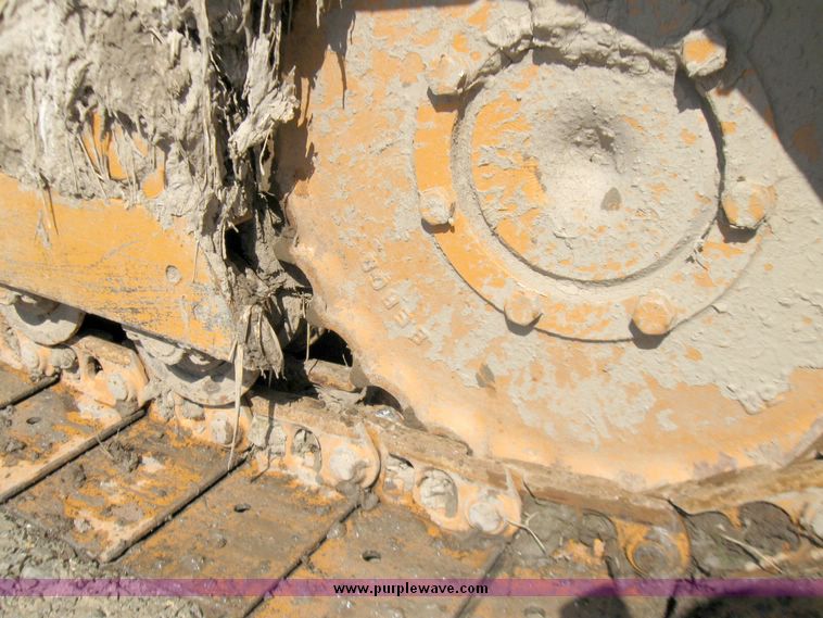 image for item 5693 Case 475 crawler tractor with vibratory plow