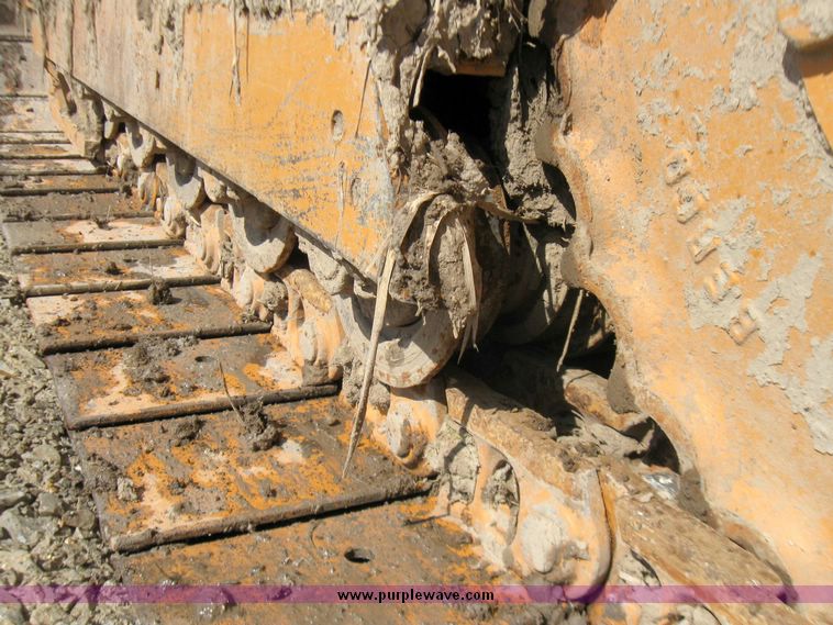 image for item 5693 Case 475 crawler tractor with vibratory plow