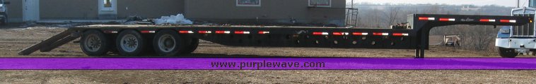 image for item 7721 1990 Transcraft triple axle trailer