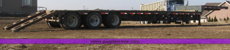 image for item 7721 1990 Transcraft triple axle trailer