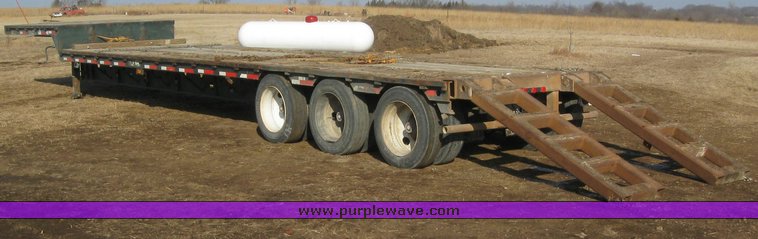 image for item 7721 1990 Transcraft triple axle trailer