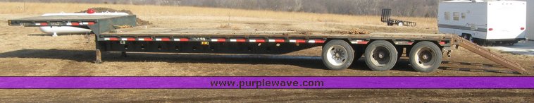 image for item 7721 1990 Transcraft triple axle trailer