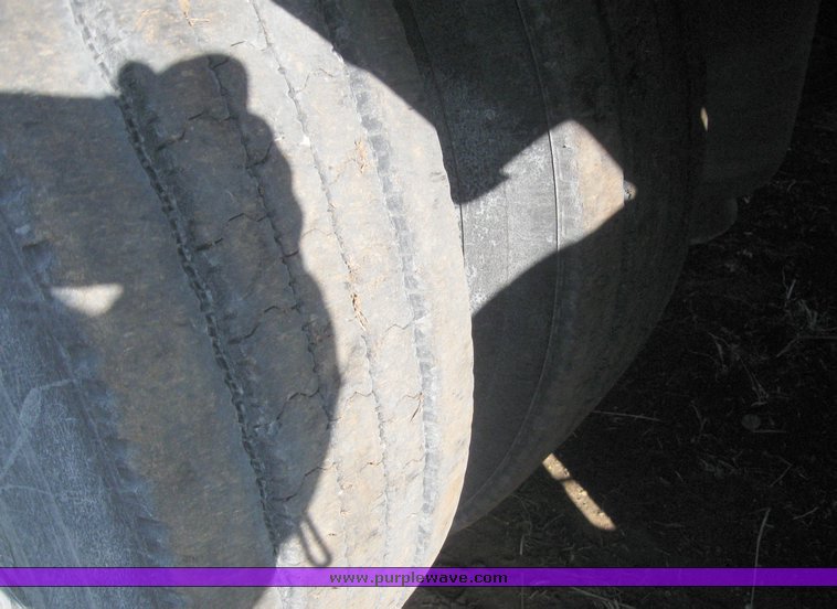 image for item 7721 1990 Transcraft triple axle trailer