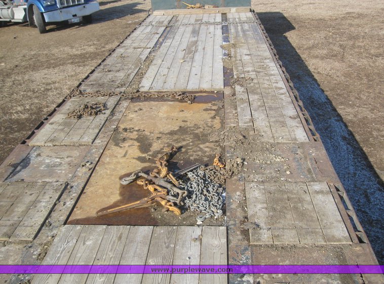 image for item 7721 1990 Transcraft triple axle trailer