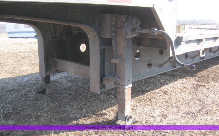 image for item 7721 1990 Transcraft triple axle trailer