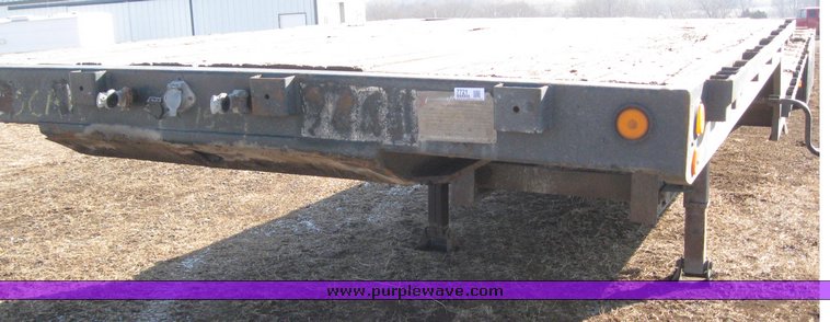 image for item 7721 1990 Transcraft triple axle trailer