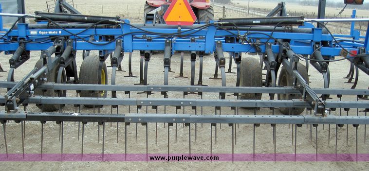 image for item 1100 1998 DMI Tigermate II field cultivator with harrows