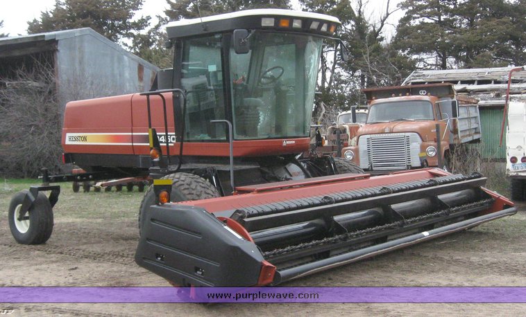 image for item 1450 2002 Hesston 8450 swather with 18' Header