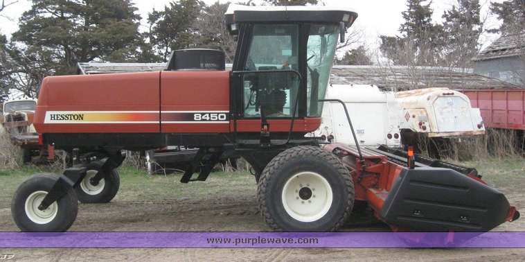 image for item 1450 2002 Hesston 8450 swather with 18' Header