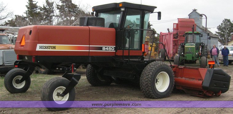 image for item 1450 2002 Hesston 8450 swather with 18' Header
