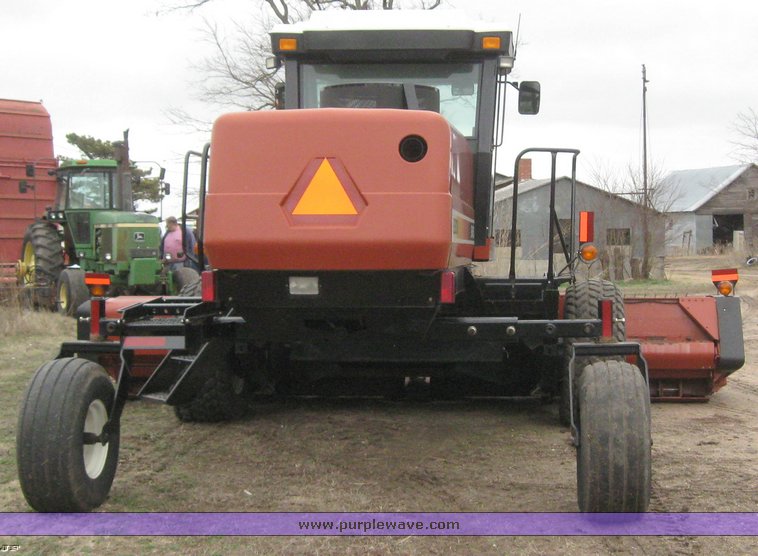 image for item 1450 2002 Hesston 8450 swather with 18' Header