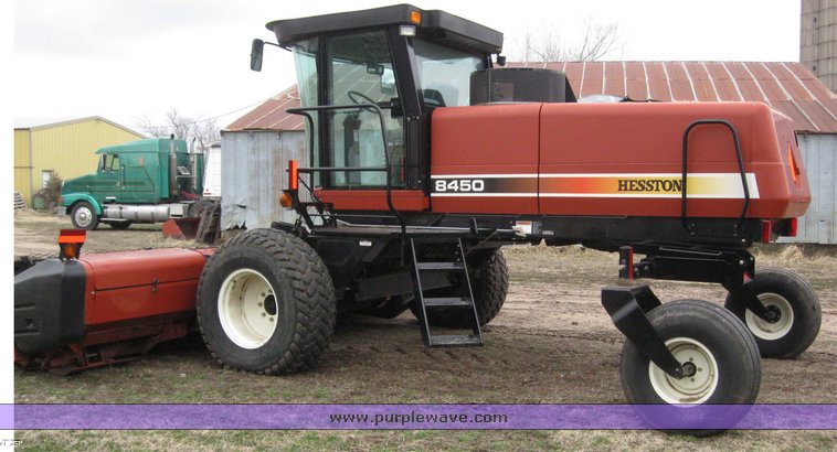 image for item 1450 2002 Hesston 8450 swather with 18' Header