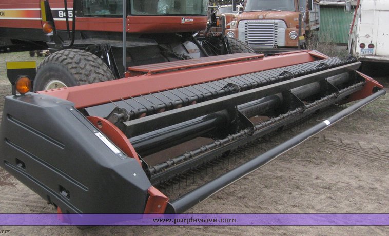 image for item 1450 2002 Hesston 8450 swather with 18' Header