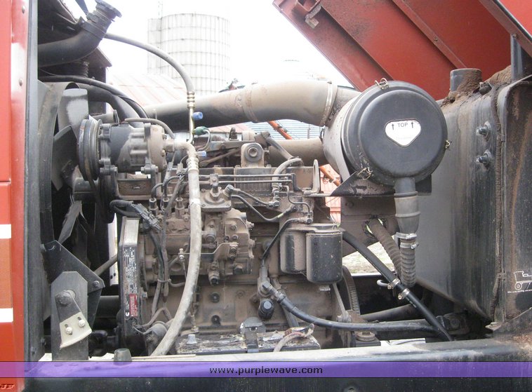 image for item 1450 2002 Hesston 8450 swather with 18' Header