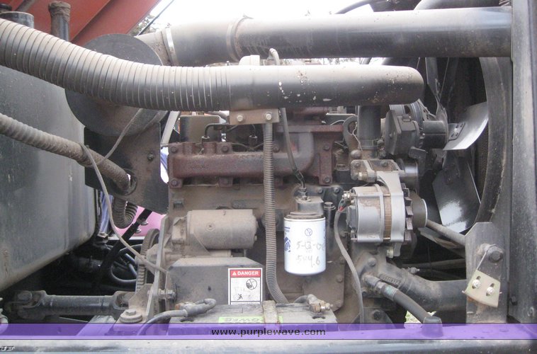 image for item 1450 2002 Hesston 8450 swather with 18' Header