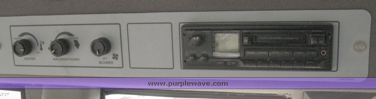 image for item 1450 2002 Hesston 8450 swather with 18' Header