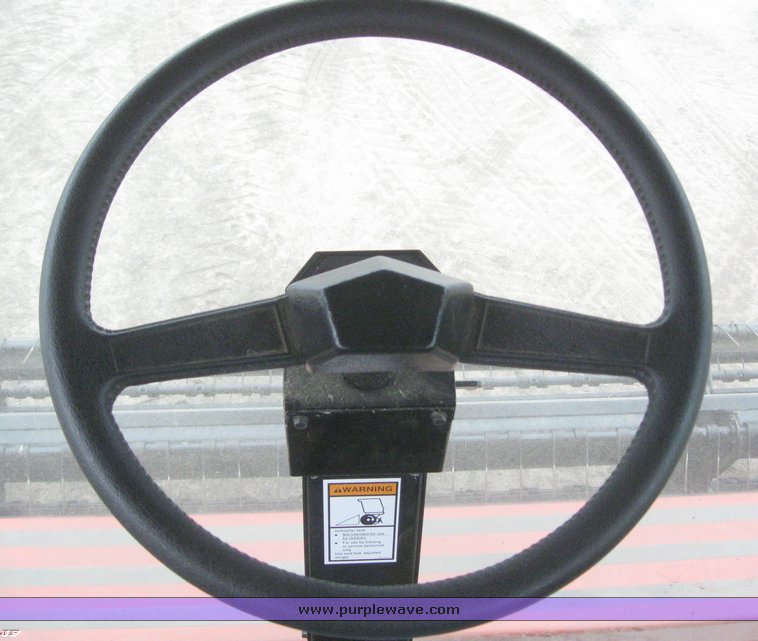 image for item 1450 2002 Hesston 8450 swather with 18' Header