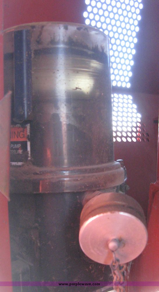 image for item 3925 2005 Hesston 4910 large square baler with bales chute