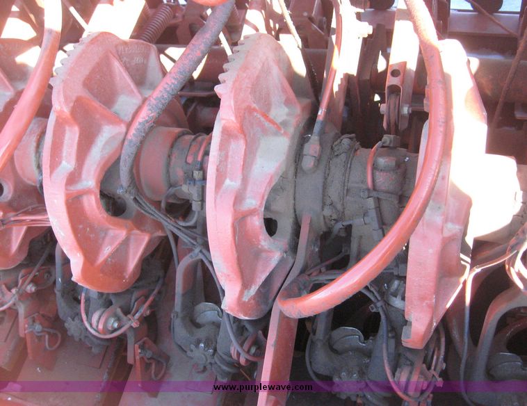 image for item 3925 2005 Hesston 4910 large square baler with bales chute