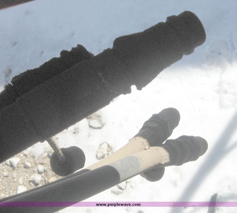 image for item 3925 2005 Hesston 4910 large square baler with bales chute