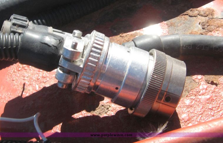 image for item 3925 2005 Hesston 4910 large square baler with bales chute