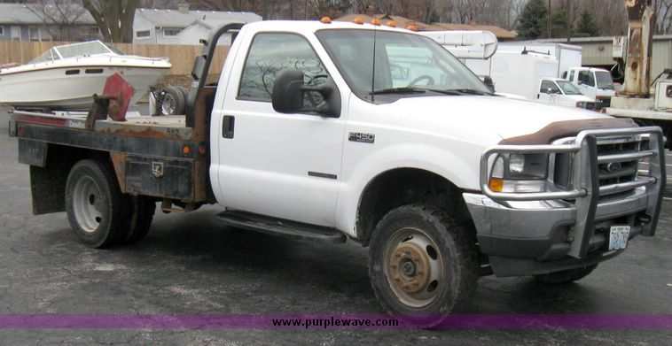 image for item 5689 2003 Ford F-450 Suder Duty pickup with DewEze bale bed