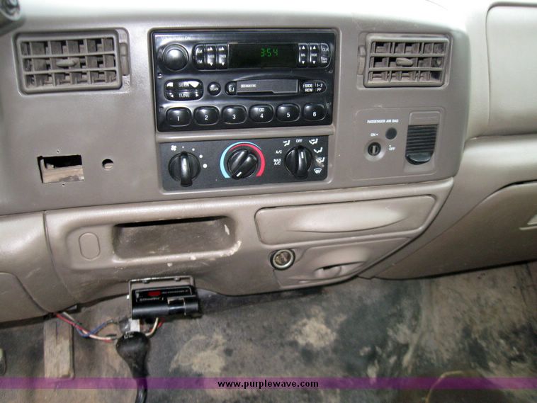 image for item 5689 2003 Ford F-450 Suder Duty pickup with DewEze bale bed