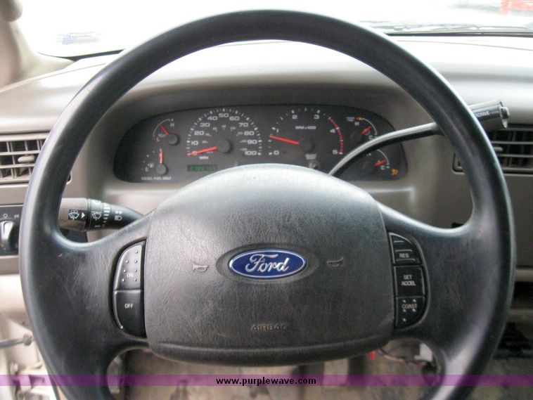 image for item 5689 2003 Ford F-450 Suder Duty pickup with DewEze bale bed