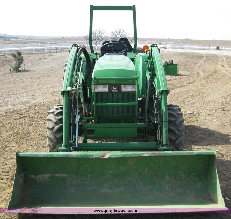 image for item 6800 2005 John Deere 990 MFWD tractor with John Deere 300CX loader