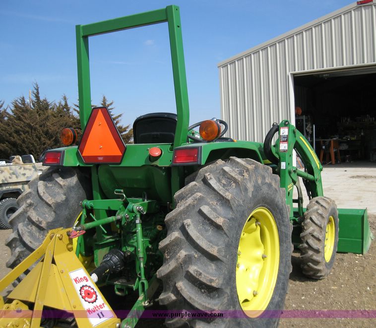 image for item 6800 2005 John Deere 990 MFWD tractor with John Deere 300CX loader