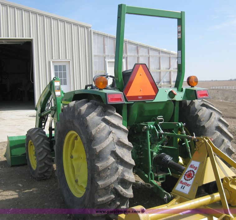 image for item 6800 2005 John Deere 990 MFWD tractor with John Deere 300CX loader