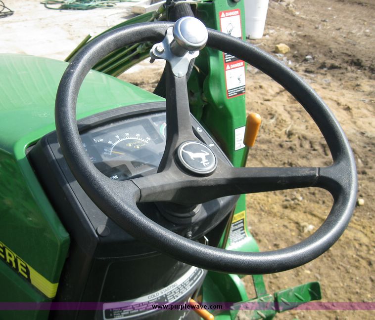 image for item 6800 2005 John Deere 990 MFWD tractor with John Deere 300CX loader