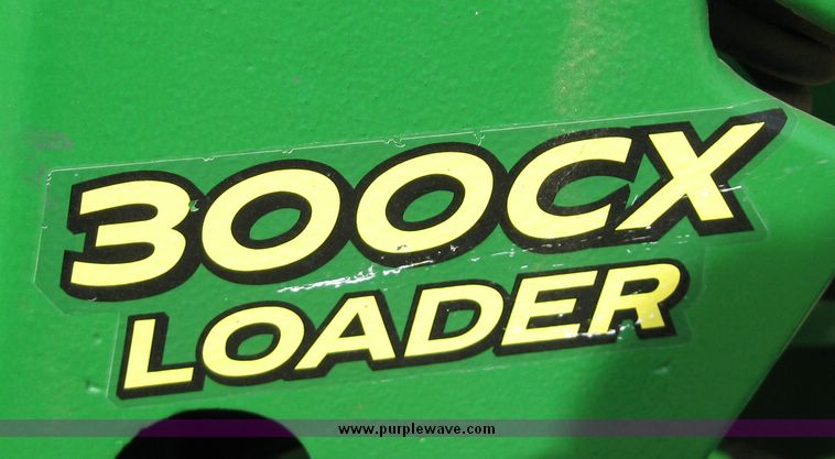 image for item 6800 2005 John Deere 990 MFWD tractor with John Deere 300CX loader