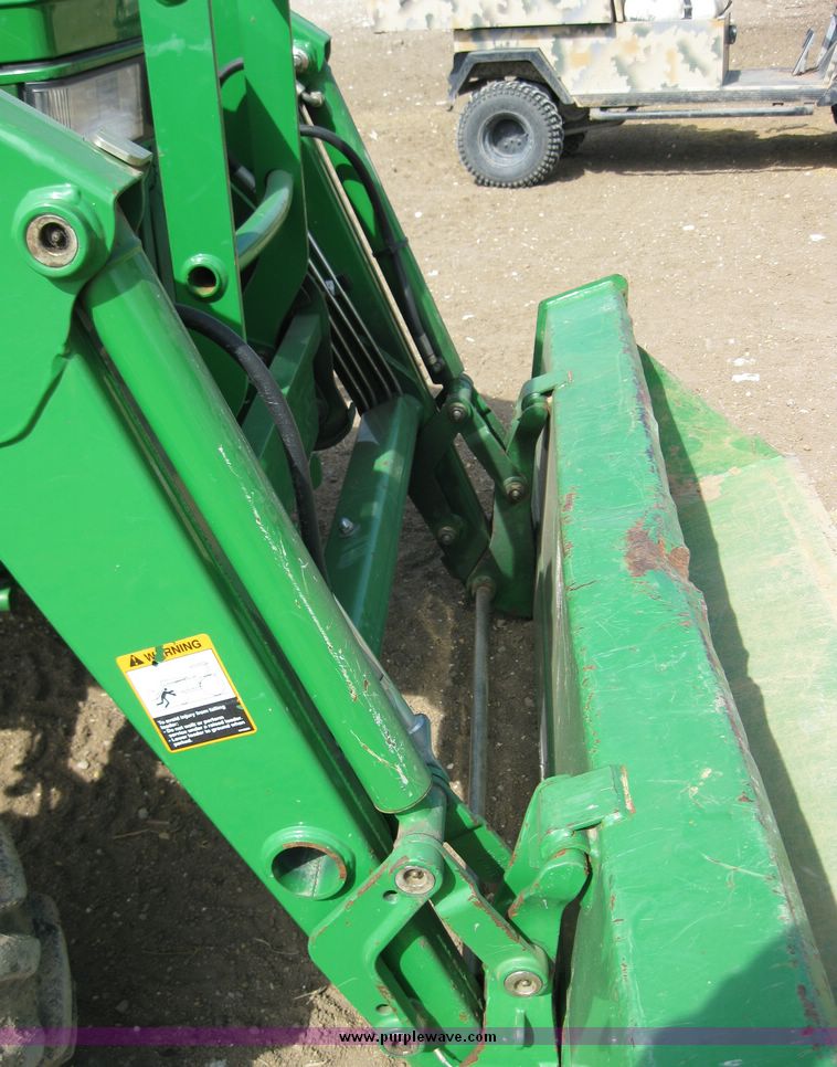 image for item 6800 2005 John Deere 990 MFWD tractor with John Deere 300CX loader