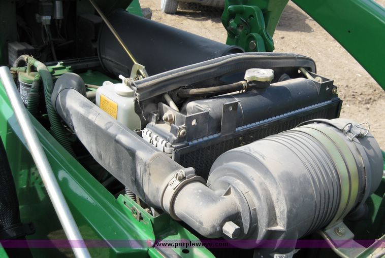 image for item 6800 2005 John Deere 990 MFWD tractor with John Deere 300CX loader