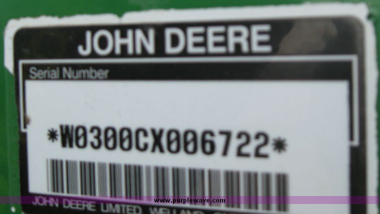 image for item 6800 2005 John Deere 990 MFWD tractor with John Deere 300CX loader