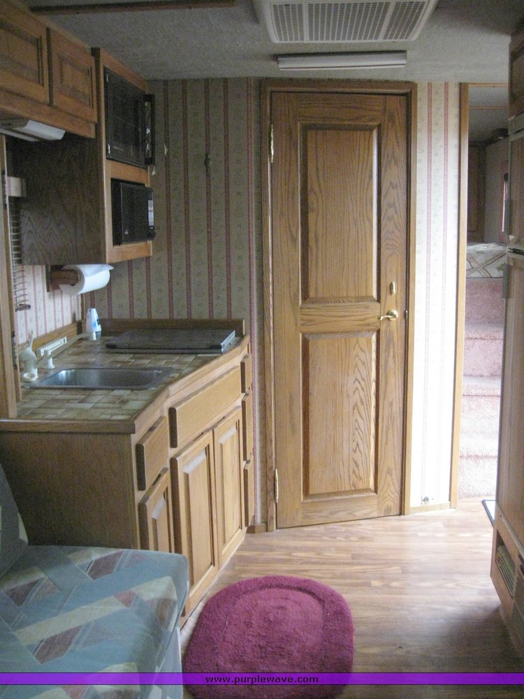 image for item 7724 1986 Touch of Class three horse slant trailer with living quarters