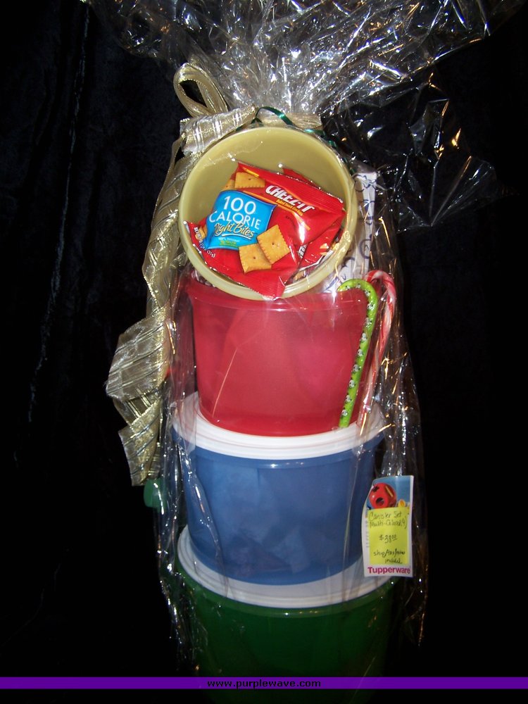 image for item 1074 Set of four multi-colored Tupperware canisters