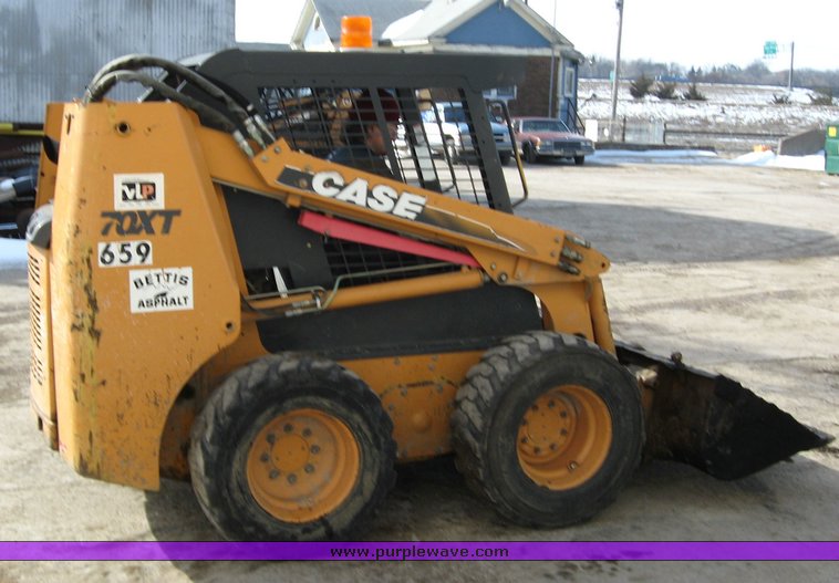 image for item 1026 2003 Case 70TX skid steer