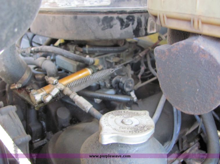 image for item 3448 1985 GMC C6500 C7D042 auger truck