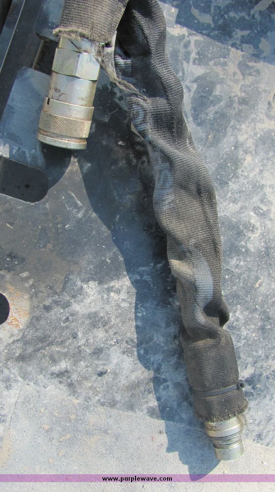 image for item 3449 2000 John Deere TR36 skid steer mount trencher