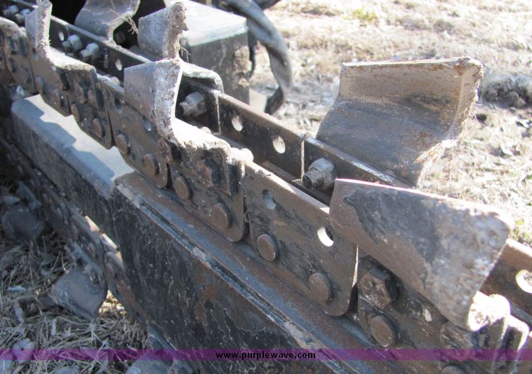 image for item 3449 2000 John Deere TR36 skid steer mount trencher