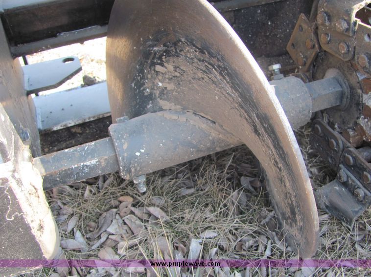 image for item 3449 2000 John Deere TR36 skid steer mount trencher