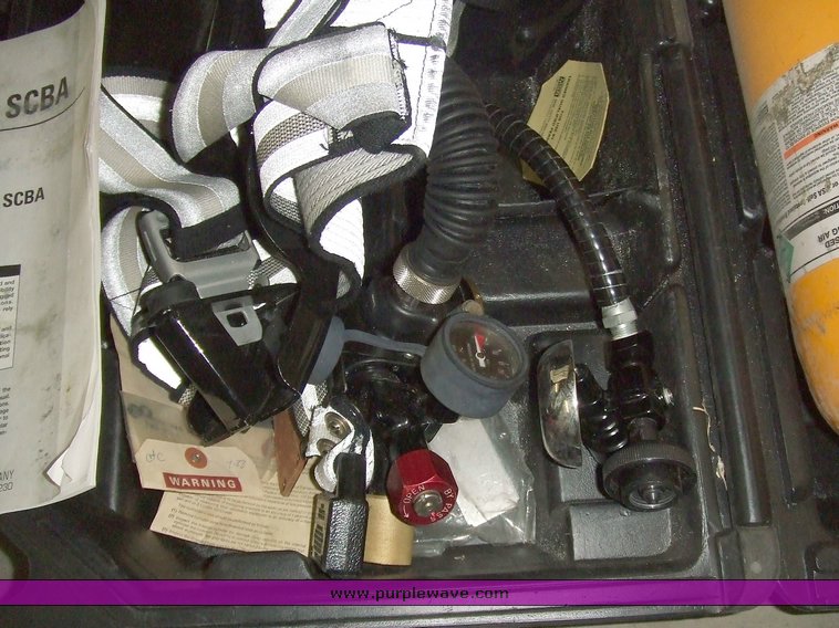 image for item 6557 MSA Ultralite II air mask with case and two tanks