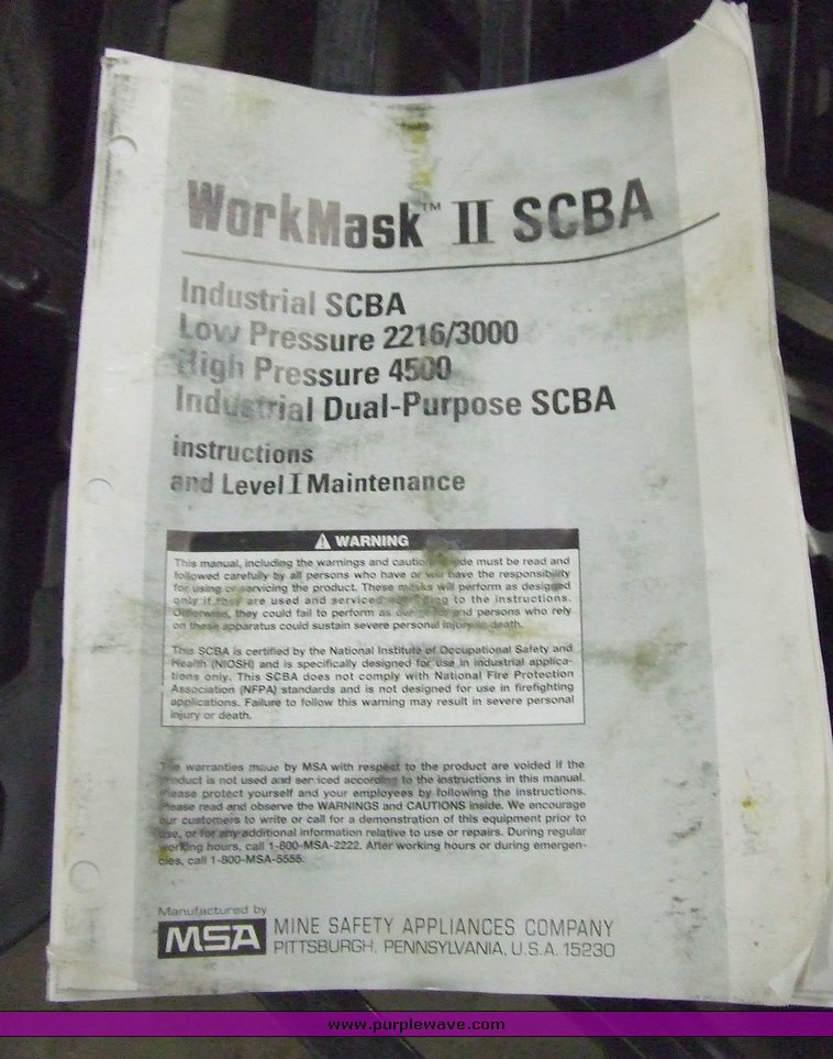 image for item 6557 MSA Ultralite II air mask with case and two tanks