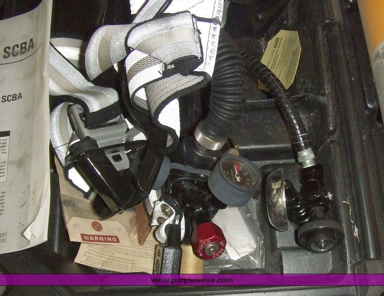 image for item 6690 MSA Ultralite II air mask with case and two tanks