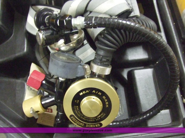 image for item 6690 MSA Ultralite II air mask with case and two tanks
