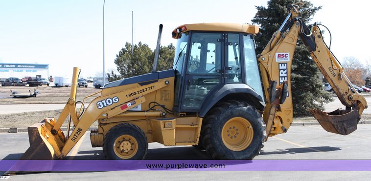 image for item 1006 2004 John Deere 310G MFWD loader backhoe
