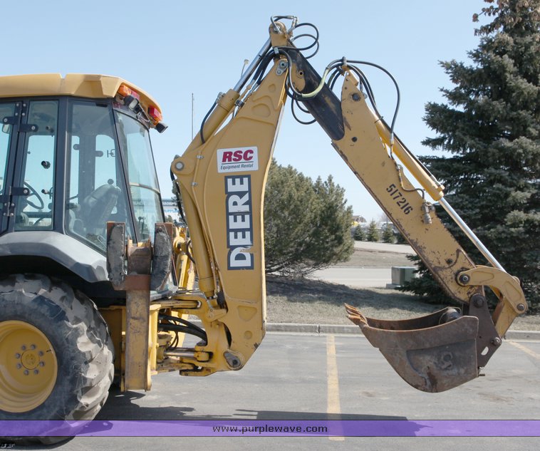 image for item 1006 2004 John Deere 310G MFWD loader backhoe