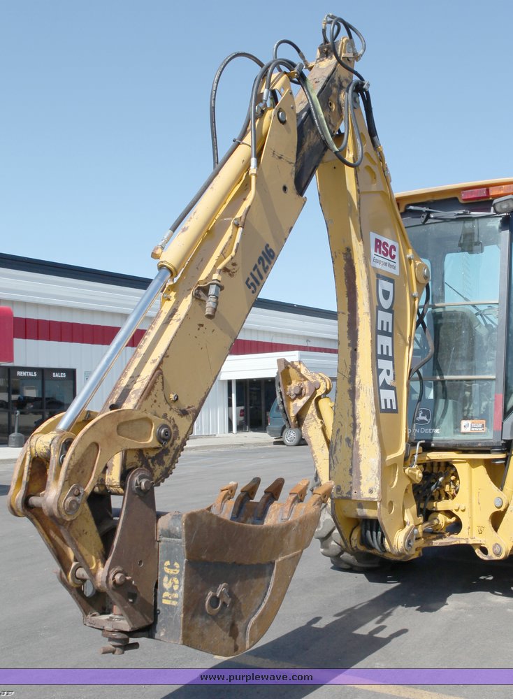 image for item 1006 2004 John Deere 310G MFWD loader backhoe